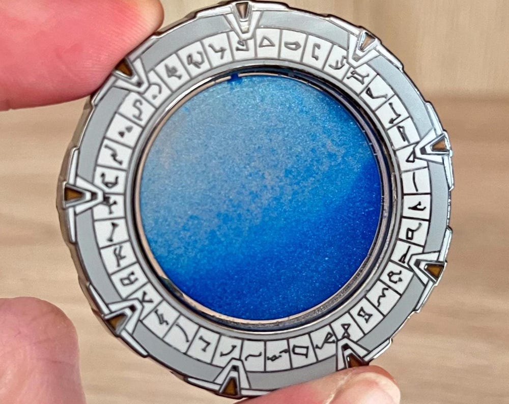 RESTOCK Liquid Stargate Enamel Pin
