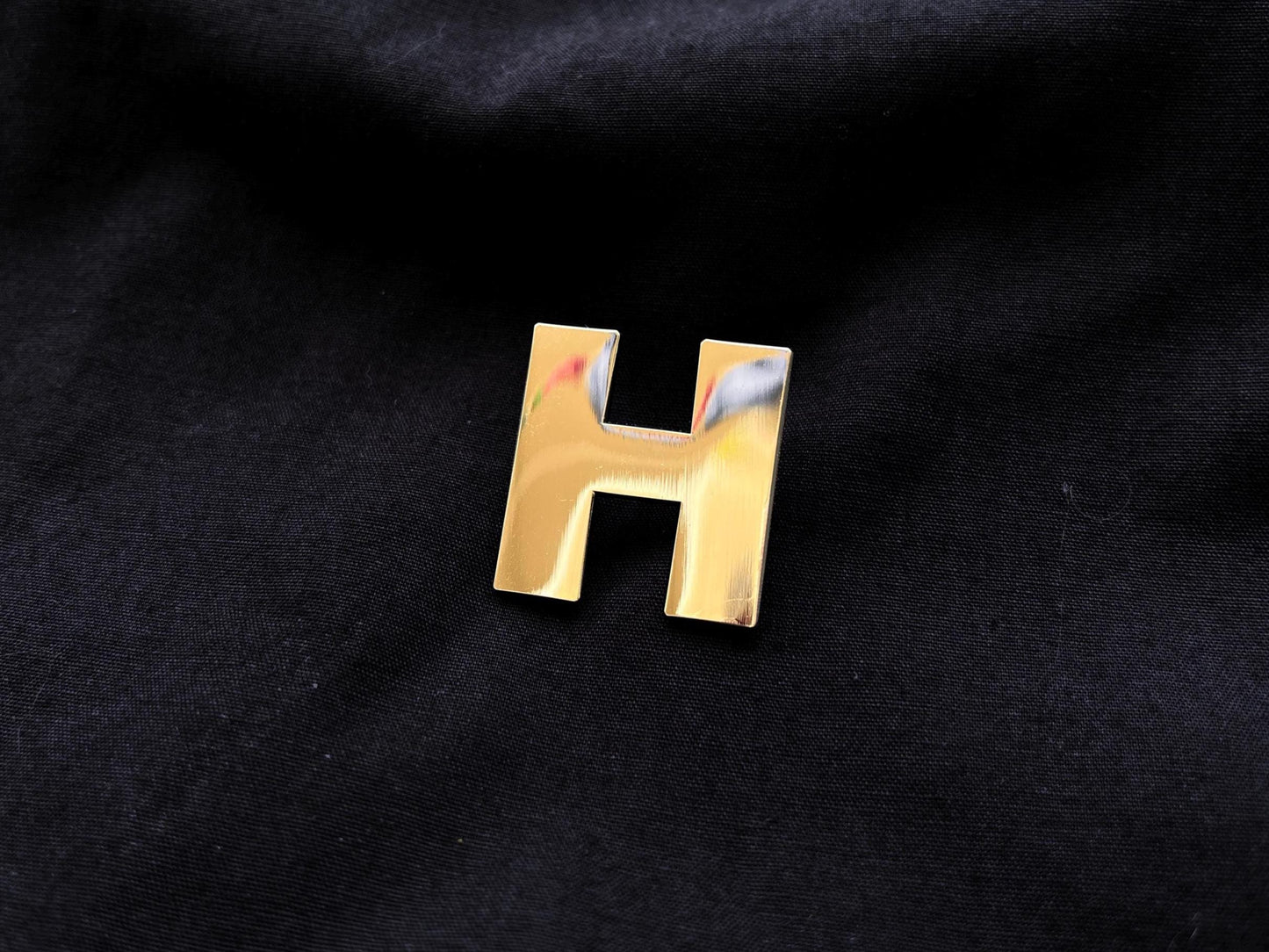H as Hologram Pin